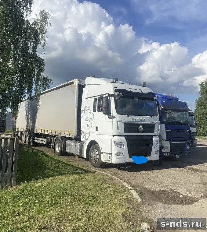 Седельный тягач Sitrak C7H с полуприцепом